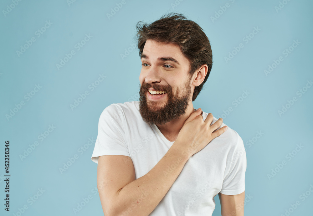 Man in a white t-shirt hand gestures Lifestyle Man in a white t-shirt hand gestures Lifestyle