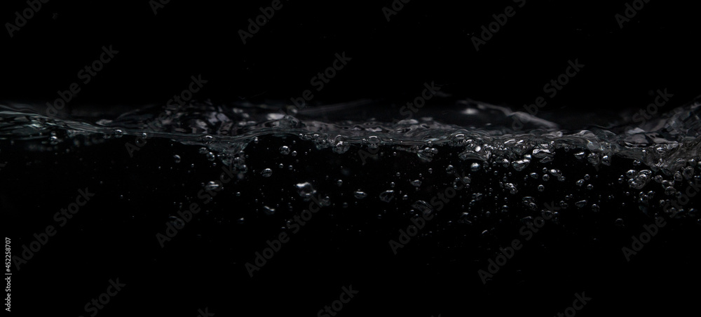 Wave of water on a black background