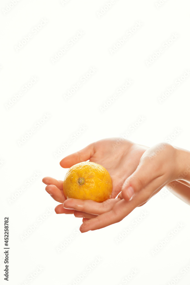 lemon in hand salad ingredient close-up lemon in hand salad ingredient close-up