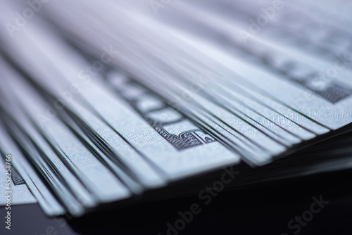 Stack of one hundred American dollars banknotes, close-up.