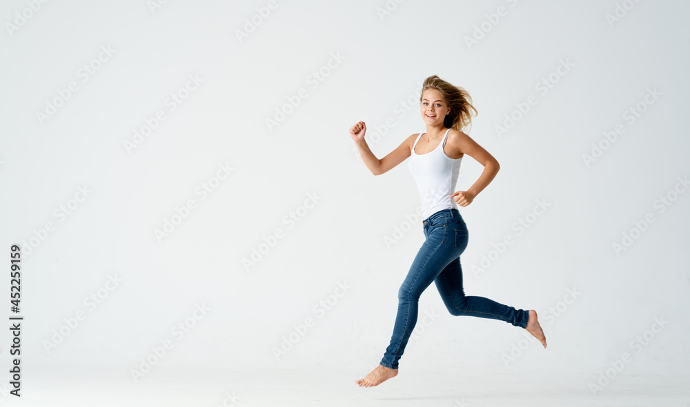 woman in jeans movement dance energy positive fashion