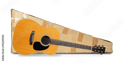 Postage and packing service, Music and sound - Acoustic retro guitar and package. Isolated