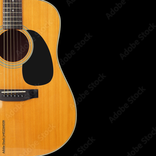 Musical instrument - Silhouette of a Front view classic vintage acoustic guitar. Isolated black