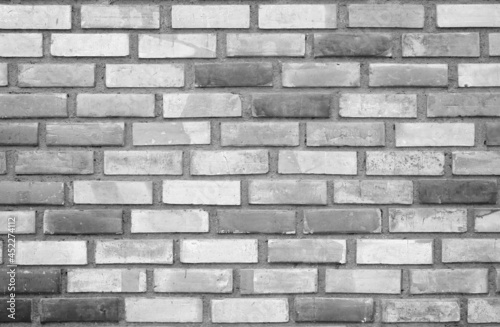 empty white and black fence brick wall or old dark floor with loft backdrop and brickwork retro style on top view for texture background and vintage wallpaper or interior and exterior construction