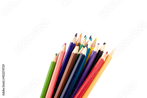 Colored pencils, school supplies drawing, pattern, copy space.