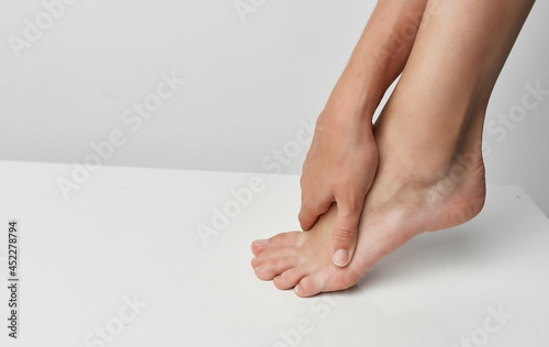foot injury massage health problems medicine close-up