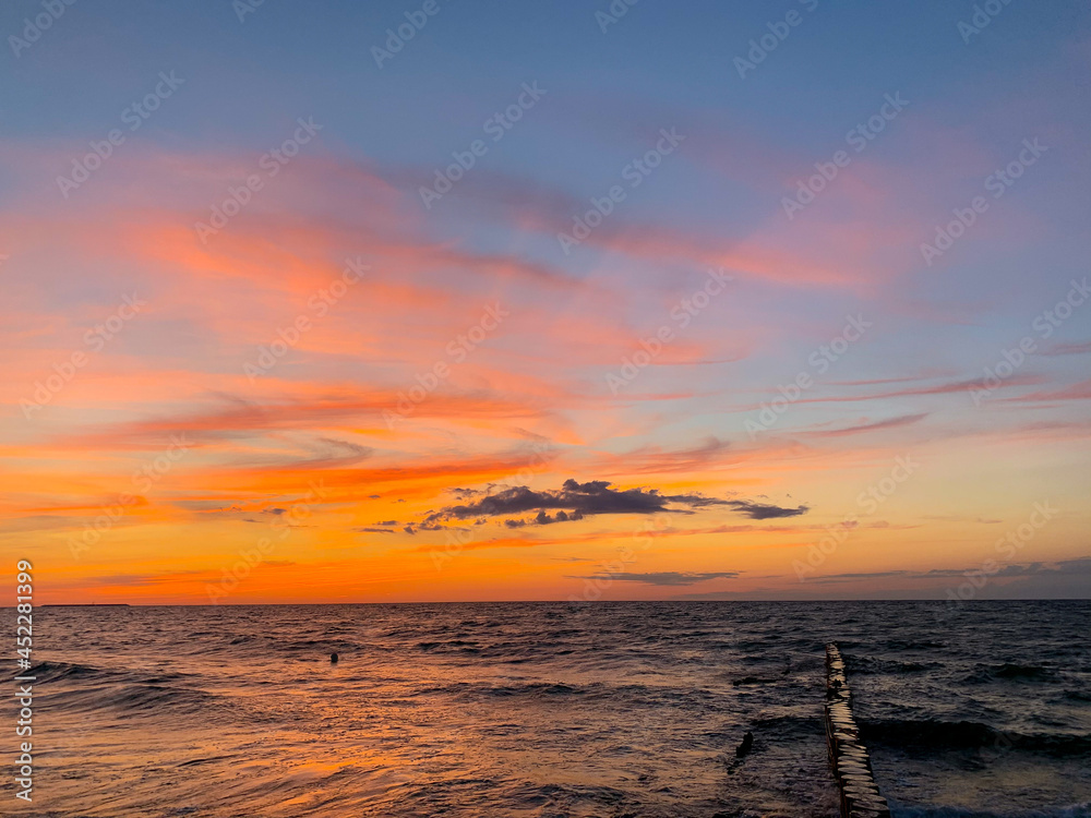 Beautiful sky colors after the sunset at the sea