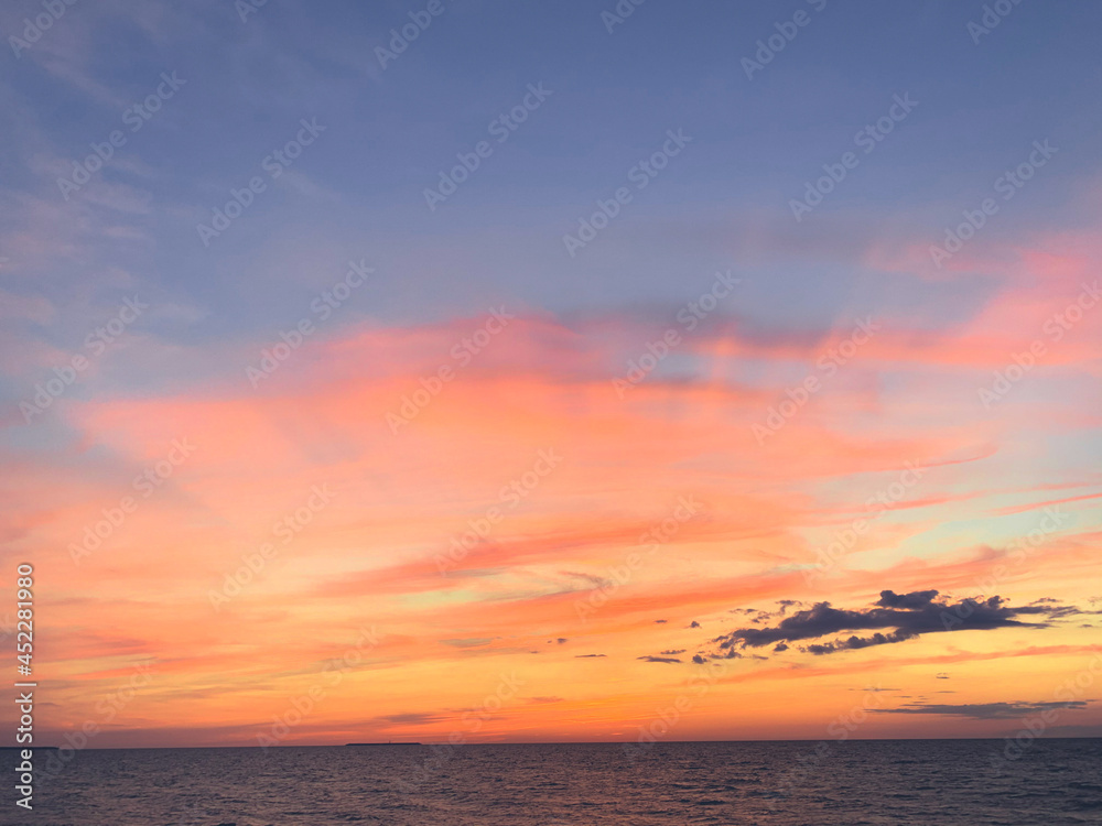 Fototapeta premium Beautiful sky colors after the sunset at the sea