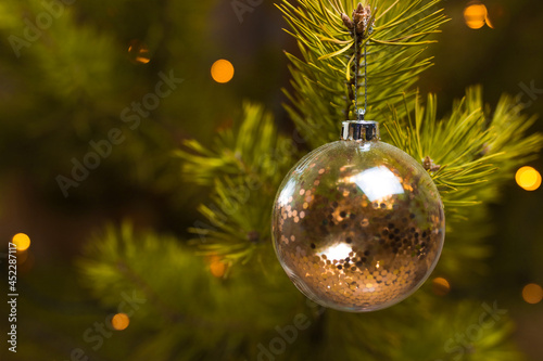 Christmas tree decorations on the branches background