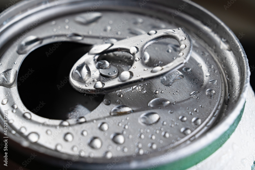 open aluminum can of drink. close-up. bar. open aluminum can of drink. close-up. bar.