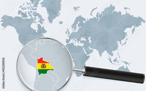 World map with a magnifying glass pointing at Bolivia. Map of Bolivia with the flag in the loop.
