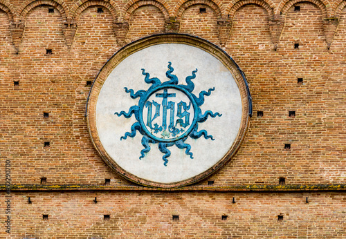 Christogram at Palazzo Publico in Siena, Italy photo