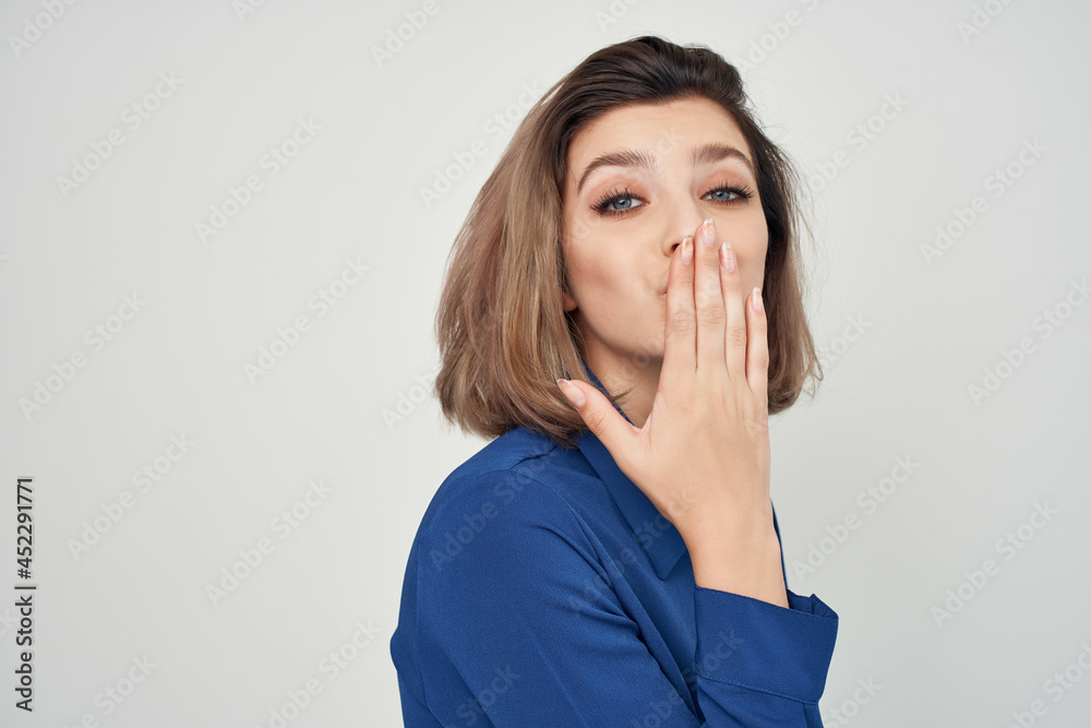 woman in blue shirt fashion posing light background woman in blue shirt fashion posing light background