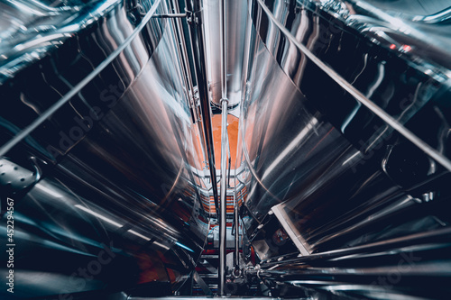 Rows of steel tanks for beer fermentation and maturation in a craft brewery