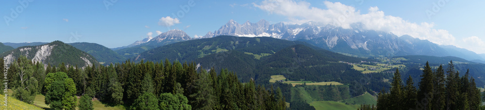 scenic alpine panorama with Dachstein mountain in the Austrian Alps in the Schladming-Dachstein region (Austria, Steiermark or Styria)	