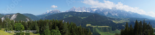 scenic alpine panorama with Dachstein mountain in the Austrian Alps in the Schladming-Dachstein region (Austria, Steiermark or Styria)	