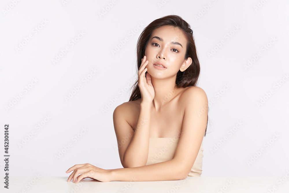 Beautiful young asian woman with clean fresh skin on white background, Face care, Facial treatment, Cosmetology, beauty and spa, Asian women portrait. Beautiful young asian woman with clean fresh skin on white background, Face care, Facial treatment, Cosmetology, beauty and spa, Asian women portrait.