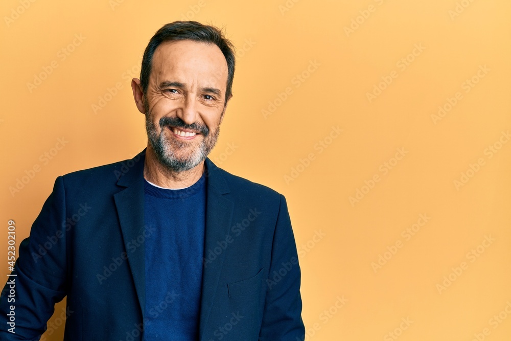 Middle age hispanic man wearing business clothes with a happy and cool smile on face. lucky person. Middle age hispanic man wearing business clothes with a happy and cool smile on face. lucky person.