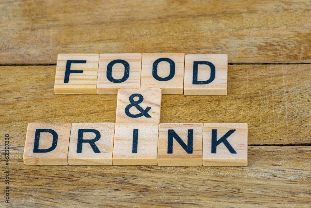food and drink in wooden letter blocks on wooden background food and drink in wooden letter blocks on wooden background