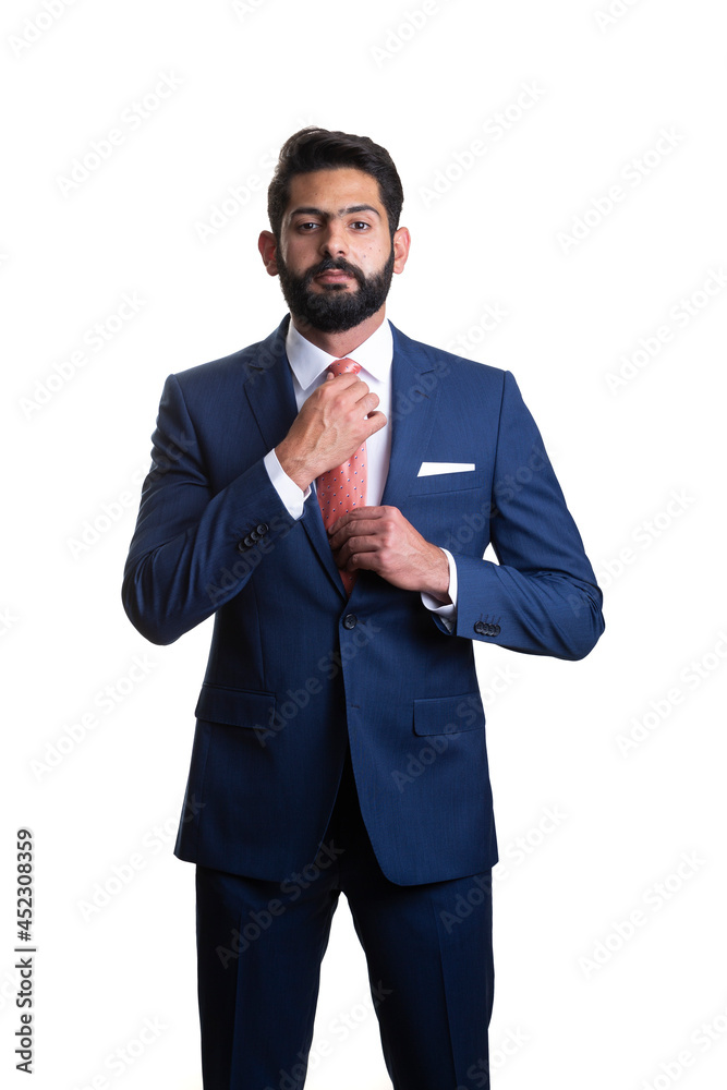 A young man wearing suit on a white background A young man wearing suit on a white background