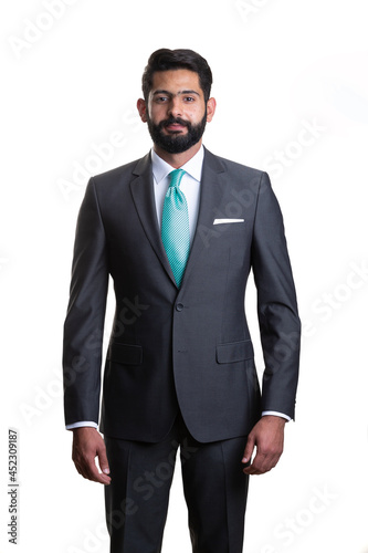 A young man wearing suit on a white background