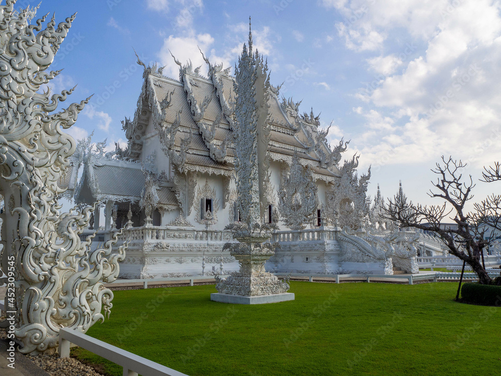 The beautiful white art architecture temple, Wat Rong Khun Temple, Chiang Rai, Thailand.