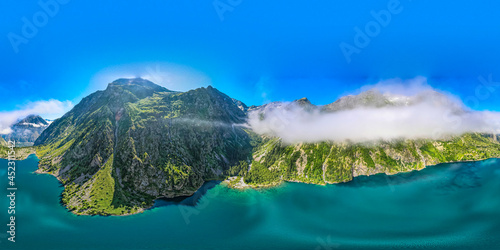Aerial view of Lac Lauvitel during the summer in the French Alps