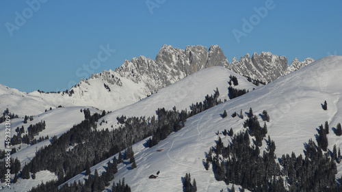 Gastlosen, snow covered mountain range near Zweisimmen. photo