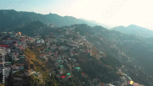 Aerial view of a small township along the mountain crest near Gun Hills, Landour, Mussoorie, India. photo