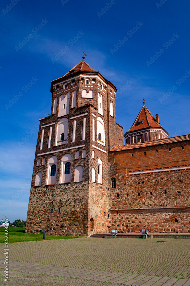 Old beautiful medieval castle fortress with towers. Ancient european architecture
