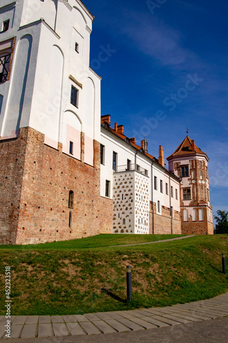 Old beautiful medieval castle fortress with towers. Ancient european architecture