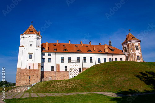 Old beautiful medieval castle fortress with towers. Ancient european architecture