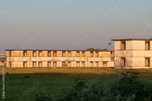 Old abandoned housing units on decommissioned military air base in the UK