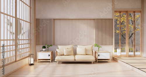 Fototapeta Naklejka Na Ścianę i Meble -  Sofa on room japan tropical desing .3D rendering