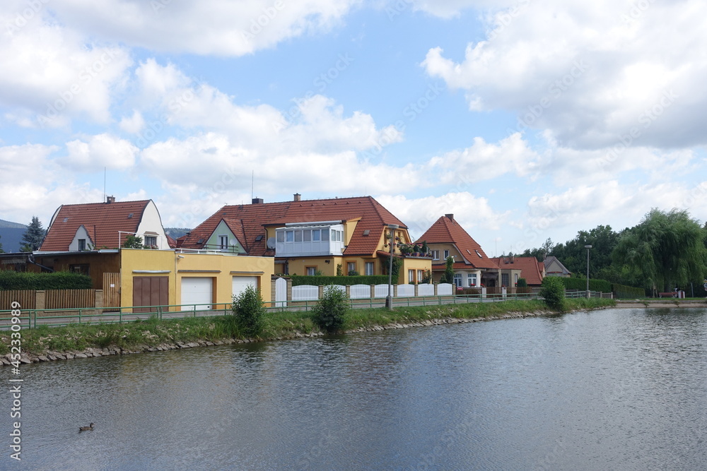 Lovely and coloful houses with river view during summer in Český Krumlov (Cesky Krumlov), a town in the South Bohemian, Czech Republic, a UNESCO World Heritage Site, Gothic, Renaissance and Baroq Lovely and coloful houses with river view during summer in Český Krumlov (Cesky Krumlov), a town in the South Bohemian, Czech Republic, a UNESCO World Heritage Site, Gothic, Renaissance and Baroq