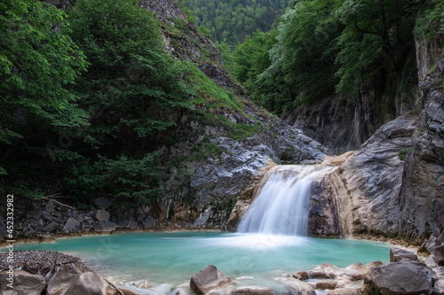 Scenic Blue Waterfall in the Green Frost