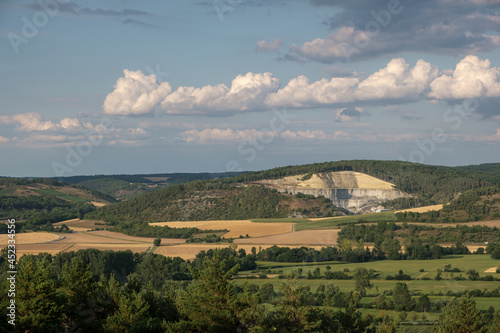 the stone quarry from the German town Werbach at summer. © Christian
