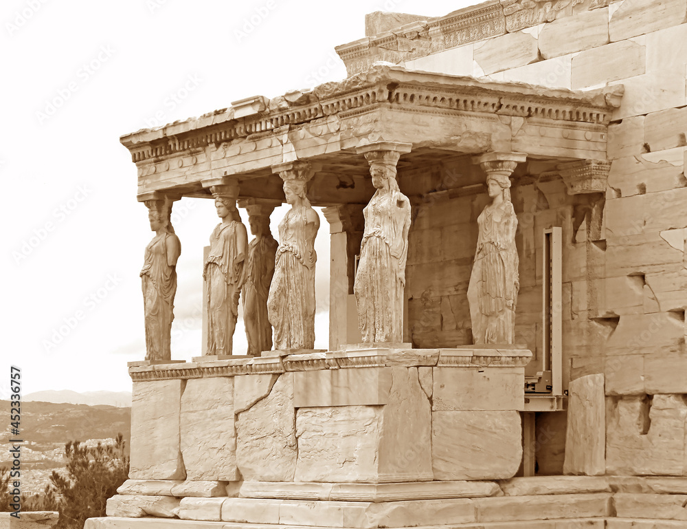 Obraz premium The Iconic Caryatid Porch of the Erechtheum Ancient Greek Temple on the Acropolis of Athens, Greece in Sepia