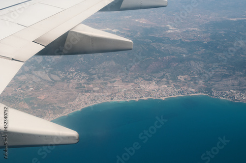 Aerial view from plane to the sea bay