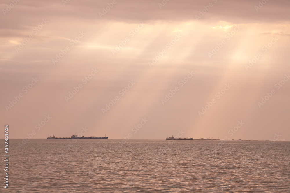 Ships at sea at sunset of the day. Ships at sea at sunset of the day.