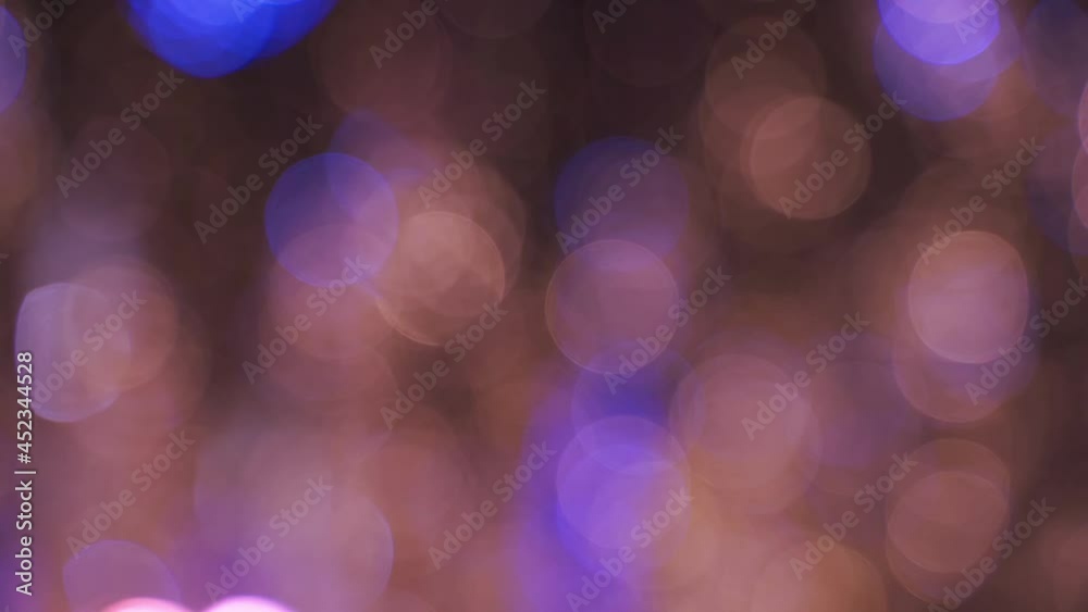 Abstract blurred blue, orange and yellow bokeh lights background in 4k Abstract blurred blue, orange and yellow bokeh lights background in 4k