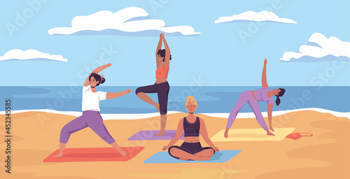 Young sporty women doing yoga exercises on the sea beach
