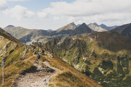 Girl hiking in Polish Tatra Mountains.