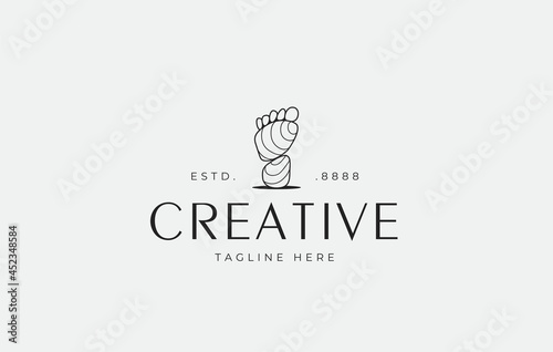 Sole Balancing Rock Logo Design Template. Balanced stacked stones resembling the soles of human feet. Creative Vector Icon Design Concept.