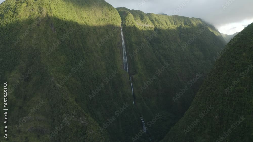 Aerial view of Cascata do Poco do Bacalhau, a beautiful waterfall in Faja Grande, Azores islands, Portugal.