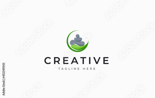 Nature Balancing Rock Logo Design Template. Balanced stacked stone on the leaf design. Creative Vector Icon Design Concept.