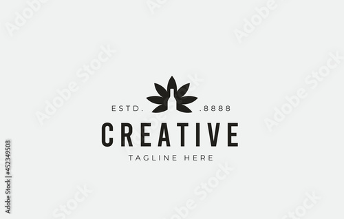 Wine bottle logo design. Icon vector illustration of abstract leaf and wine bottle. Modern logo design with line art style.