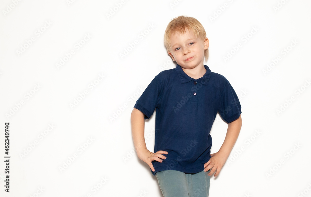 Cheerful little boy on a white background Cheerful little boy on a white background
