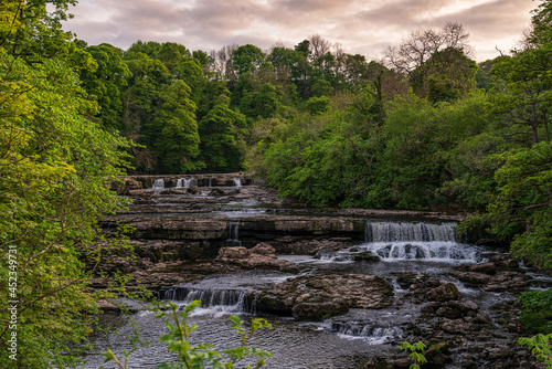 View at the Aysgarth Falls and the River Ure from the Yore Bridge, North Yorkshire, England, UK