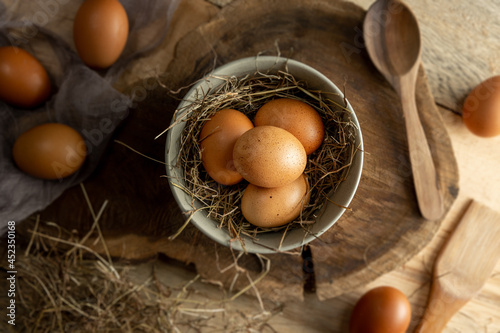 eggs in plate on wooden table